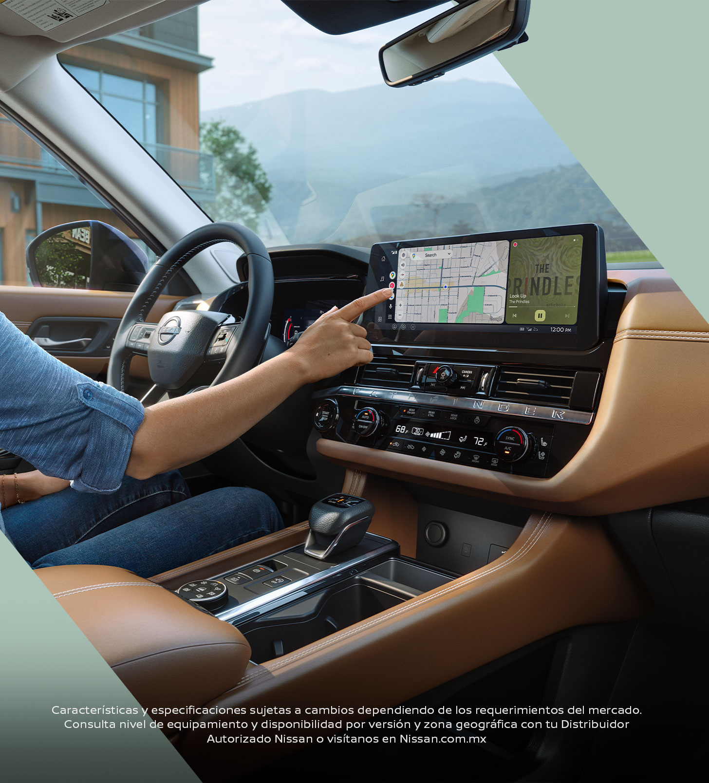 Manos al volante y consola central de Nissan Pathfinder 2026